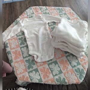 Premie Carter's white onesies gently used